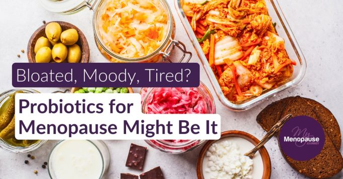 Fermented probiotic foods for menopause — sauerkraut, kimchi, olives, kefir, and dark chocolate flatlay