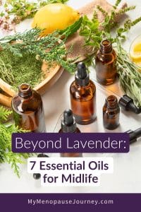 essential-oils-for-menopause-blog Pin showing amber essential oil bottles with dried herbs — lesser-known essential oils for midlife women
