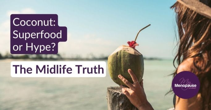 Coconut superfood guide &mdash; woman holding a fresh green coconut in midlife