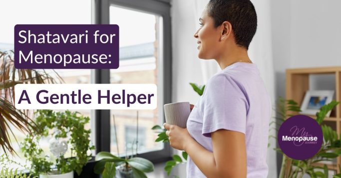 Midlife woman enjoying a warm herbal tea in her kitchen — shatavari for menopause