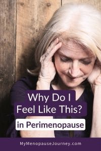 Worried woman with her head in her hands, feeling anxiety and depression in perimenopause