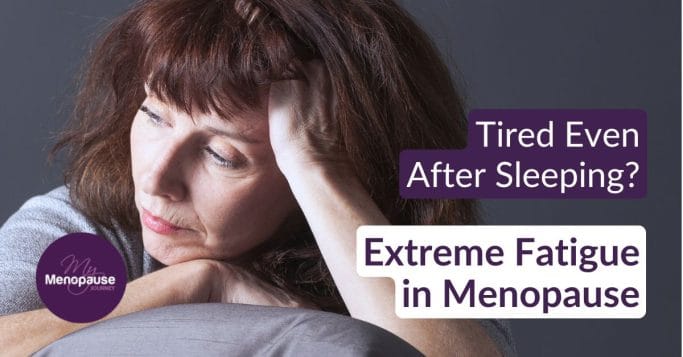Tired midlife woman holding a coffee cup in her kitchen, dealing with extreme fatigue in menopause