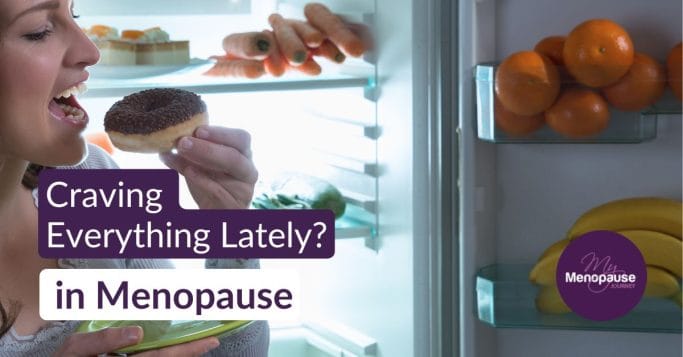 Midlife woman enjoying tea in her kitchen, calm and free of food cravings in menopause