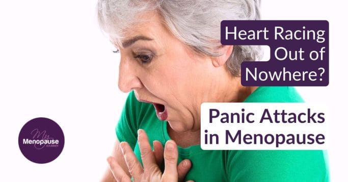 Gray-haired woman gasping with a hand on her chest during a sudden panic attack