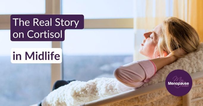 Calm midlife woman with morning coffee in a sunny kitchen — cortisol detox truth in menopause